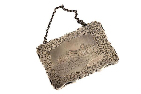 A Victorian silver card case depicting Queen's College, Cork, at Fonsie Mealy. A Victorian silver card case depicting Queen's College, Cork, at Fonsie Mealy.