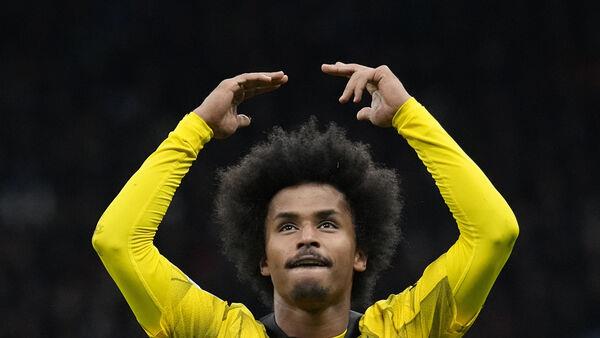 Champions League round-up: Dortmund and Barcelona through to last 16